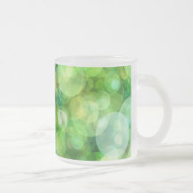 Abstrakte grüne Lichter Kaffee Haferl