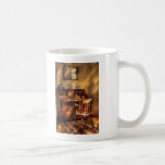 Auteur - une chaise et un bureau tasse à café