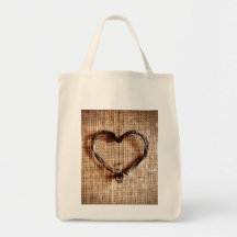 Coeur rustique de ficelle de pays sur la copie de  sac
