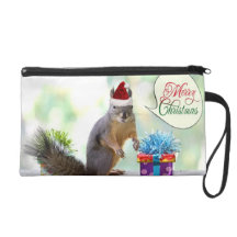 Écureuil de Noël avec des cadeaux de Noël Dragonnes