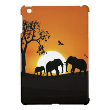 Éléphants au coucher du soleil