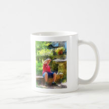 Garçon avec le yo-yo tasse