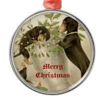 Hunde, die mit Weihnachtsmistelzweig u. heiliger B