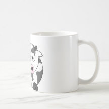 La vache indique le μ tasse à café