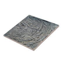 Motif de remous sur la surface rocheuse foncée carreau en céramique