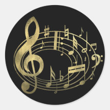 Notes musicales d'or dans la forme ovale adhésif rond