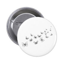 Papillons dansant à travers la page badges