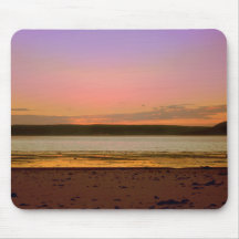 Rivage de coucher du soleil tapis de souris