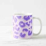 Tasse de café pourpre et blanche d'empreinte de lé