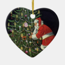 Weihnachtsmann, der Kerzen auf dem Weihnachtsbaum  Ornamente
