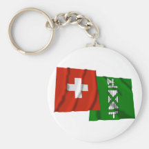Wellenartig bewegende Flaggen der Schweiz u. Sankt Schlüsselbänder