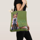 Suche nach sitzen sie taschen Babytiere