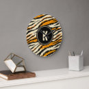Recherche de motif orange horloges Tigre
