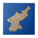 Recherche de cartoons carreaux Pays