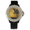 Recherche de chameaux montres Aride