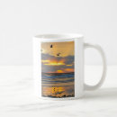 Recherche de mouettes tasses Lever de soleil