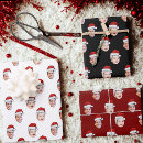 Suche nach für leiter geschenkpapier Foto mit weihnachtsmannmütze