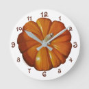 Recherche de citrouilles horloges Automne