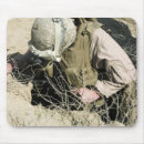 Recherche de cache tapis souris Irak