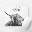 Recherche de vache noire tapis souris Animal