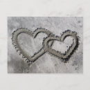 Recherche de deux coeurs cartes postales Sable