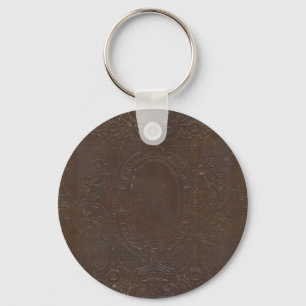 150 Jahre alte grungy Buchdecke Schlüsselanhänger