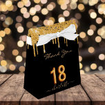 18th birthday glitter drips black gold thank you geschenkschachtel<br><div class="desc">Elegant, classic, glamorous and girly for a 18th birthday party. A chic black background. Decorated with faux gold glitter drips, paint dripping look. Personalize and add a name. With the text: Thank You plus the birthday girls name. The name is written with a modern golden colored hand lettered style script...</div>