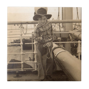 1935 jugendlicher Cowboy an Bord Fliese