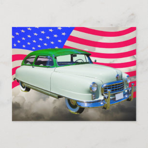 1950 Nash Ambassador Auto und amerikanische Flagge Postkarte