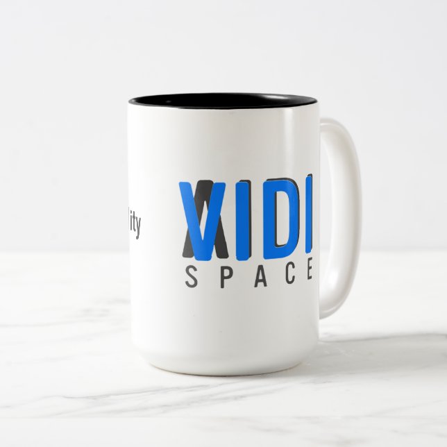 2 COULEURS ENTREZ DANS NOTRE TASSE DE LA RÉALITÉ VIDI (Devant droit)