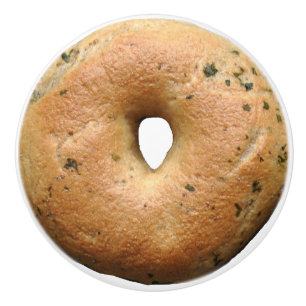 2D Grafik des lustigen Feinschmeckers des Bagels Keramikknauf