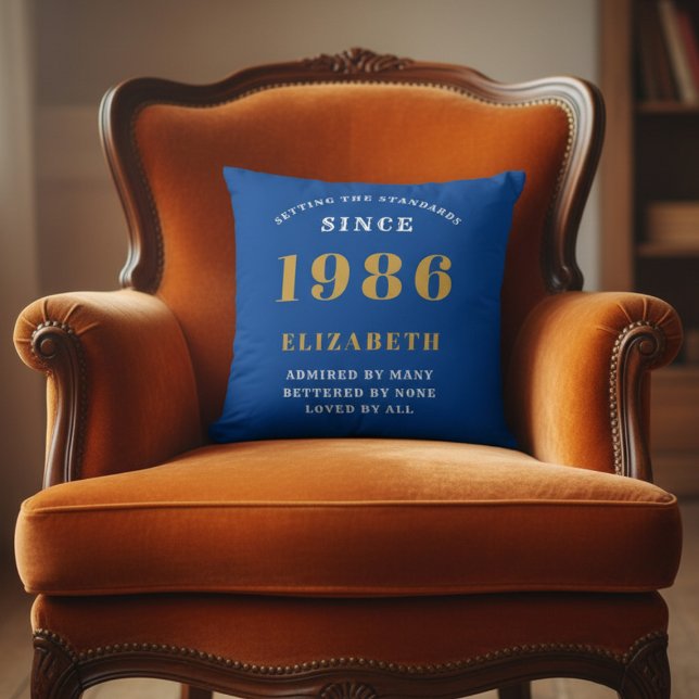 40th Birthday 1986 Add Name Blue Gold Personalized Kissen (1986 blue throw pillow on an orange chair)