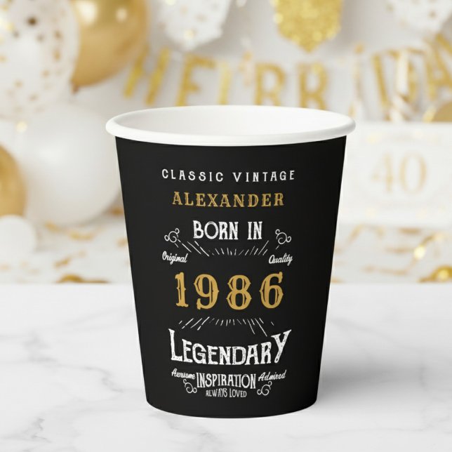 40th Birthday 1986 Legendary Retro Pappbecher (1986 birthday black paper cup on a white and gold background.)