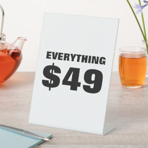 49 $ Verkaufsabrechnung, 49 $ Preisabrechnung, Hän Sockelschild