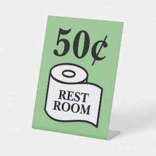 50 Cent für die Toilettenpapier-Rolle des öffentli Sockelschild