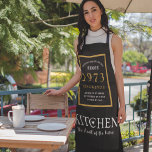 50th Birthday 1973 Name Elegant Black Gold Chic Schürze<br><div class="desc">A wonderful birthday black and gold design on an apron for that special celebration. Easily customize the text using the template provided. Part of the setting standards range of birthday supplies.</div>