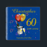 60th Birthday Celebration Blue Party Guest Notizbuch<br><div class="desc">A stylish 60th birthday party guest book, with ice bucket , bottle of sparkling wine, flute glasses , age balloons and confetti all on a blue background with gold colored text. This fabulous birthday guest book makes a fabulous gift or party memento. Perfect for milestone birthdays such as 40th, 50th...</div>