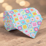 70s Granny Square Crochet Necktie Krawatte<br><div class="desc">This unique necktie features a vibrant 70s-inspired design, crafted with intricate granny square crochet. It's a bold and stylish statement piece, perfect for adding a touch of retro charm and handmade artistry to any outfit. The warm, inviting colors and textured pattern make it a conversation starter, suitable for both casual...</div>