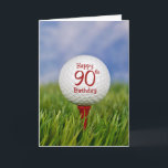 90th Birthday Golf Ball Karte<br><div class="desc">Close up of a white golf ball on a red tee in grass with sky background for 90th birthday.</div>