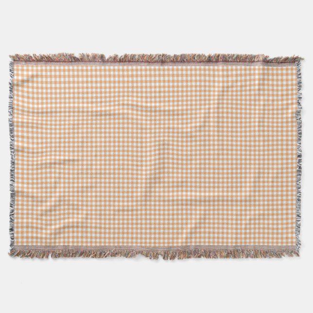 A gingham checkered blanket in shades of beige  decke (Vorderseite)
