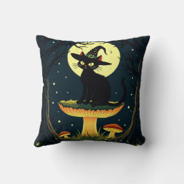 A Little Black Witchy Cat Sitting On A Toadstool Kissen