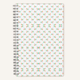 A notebook with a spiral binding features a white  notizbuch