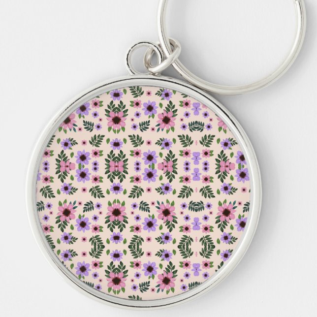 A round keychain featuring a vibrant floral  schlüsselanhänger (Vorne)