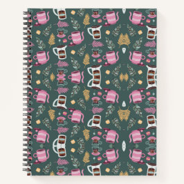 A spiral-bound notebook with a festive pattern notizbuch