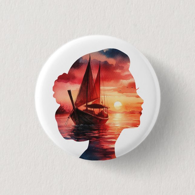 a woman's head enveloping a sunset with a sailboat button (Vorderseite)
