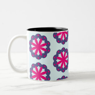 Abbildung der lila und rosa Blumenformen Zweifarbige Tasse