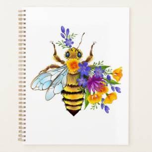 Abeille à fleurs avec plantes sauvages