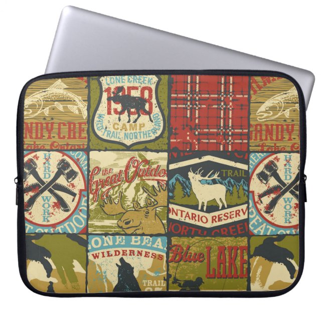 Abenteuerzeichen und Symbol-Patchw in Nordgebieten Laptopschutzhülle (Vorderseite)