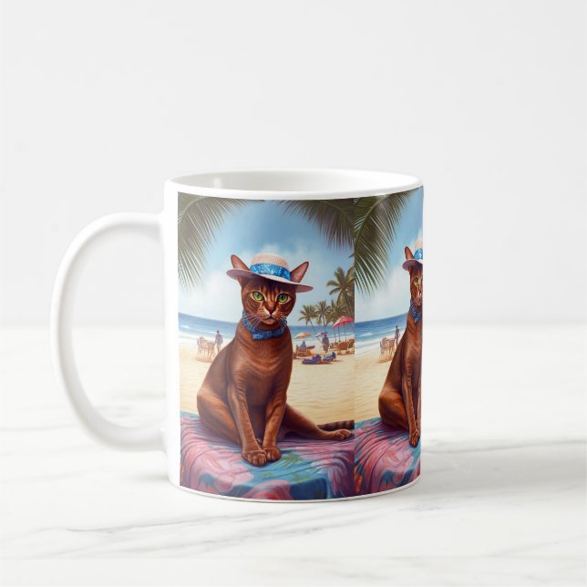 Abessinienkatze am Strand, Sommergeschenk für Katz Kaffeetasse (Links)