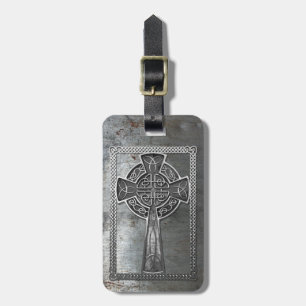 Abgenutztes Metallkreuz Gepäckanhänger